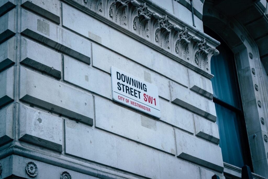 2024 Elections and Their Impact on the Global Economy - a street sign on the side of a building